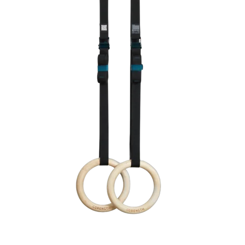 Wooden gym rings hanging from adjustable black straps
